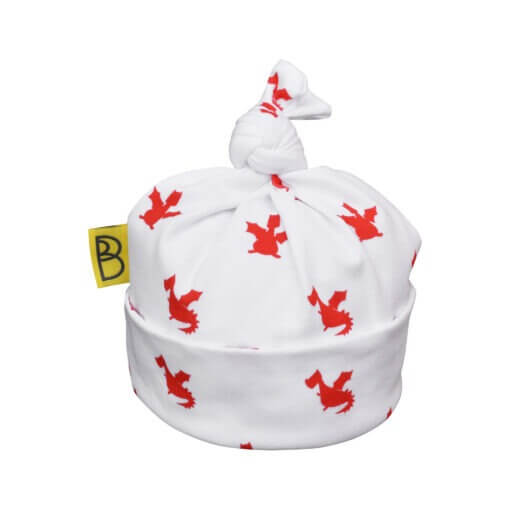 Handmade white organic cotton baby hat with cute red dragon design and a knot at the top, can be personalised with baby’s name