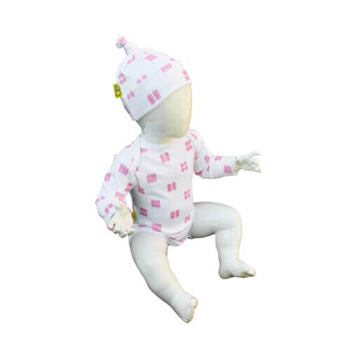 Organic cotton bodysuit with long sleeves and matching hat, featuring a pink tapestry pattern, designed for babies.