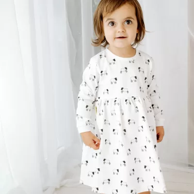 Handmade long sleeve white organic cotton Baby girl dress with cute Welsh sheep print with two fasteners to adjust back