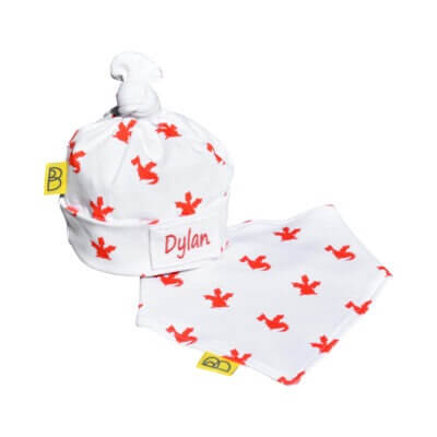 Organic baby hat & bib gift set both with our hand drawn red playful dragon print on to white cotton, the hat has a cute little hand tied knot on top.