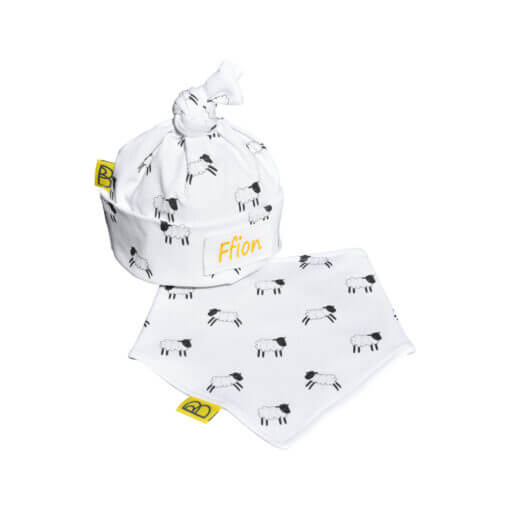 White organic cotton hat and bib gift set in our cute Welsh sheep design and can be personalised