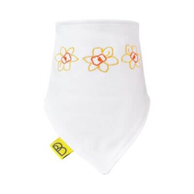 Handmade white Welsh organic cotton baby bib embroidered with yellow and orange daffodils and two fastenings to adjust fit