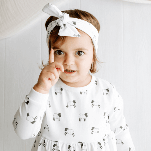 Leaping lambs design organic cotton baby dress and headband by Babi Bw