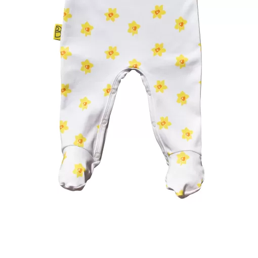 White organic cotton baby sleepsuit with vibrant daffodil design fasteners inside legs for easy opening, can be personalised