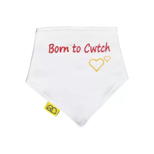 Handmade white Welsh organic cotton baby bib embroidered words Born to Cwtch in red and have two fastenings to adjust fit