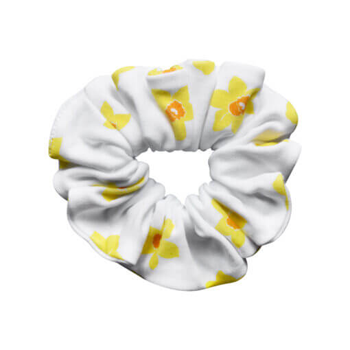 Handmade white organic cotton elasticated scrunchie for a little girl in a vibrant daffodil design