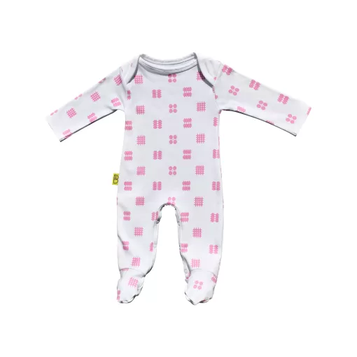 White organic cotton Welsh baby sleepsuit with pink Celtic design fasteners inside legs for easy opening, can be personalised