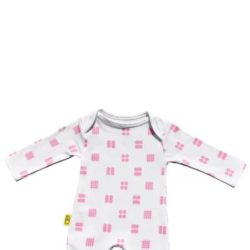 White organic cotton Welsh baby sleepsuit with pink Celtic design fasteners inside legs for easy opening, can be personalised