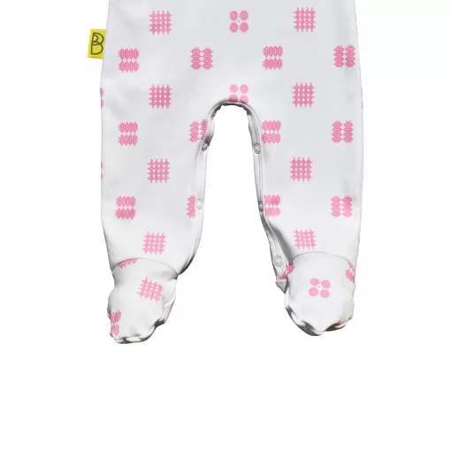 White organic cotton Welsh baby sleepsuit with pink Celtic design fasteners inside legs for easy opening, can be personalised