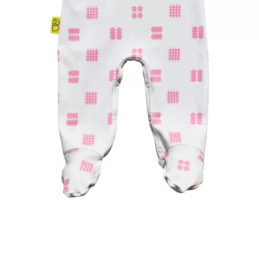 White organic cotton Welsh baby sleepsuit with pink Celtic design fasteners inside legs for easy opening, can be personalised