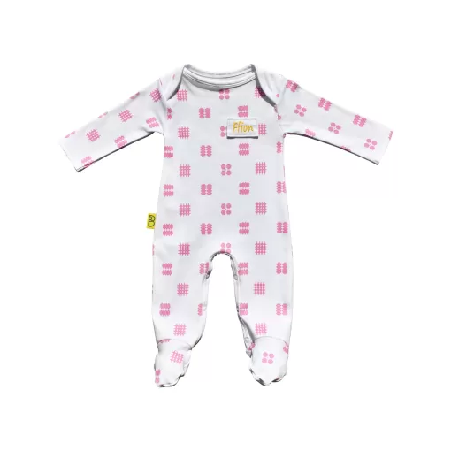 White organic cotton Welsh baby sleepsuit with pink Celtic design fasteners inside legs for easy opening, can be personalised