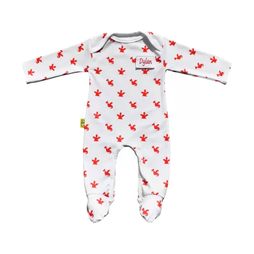 White organic cotton baby sleepsuit with cute red dragon design fasteners inside legs for easy opening, can be personalised