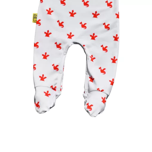 White organic cotton baby sleepsuit with cute red dragon