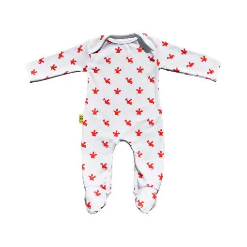 White organic cotton baby sleepsuit with cute red dragon design fasteners inside legs for easy opening