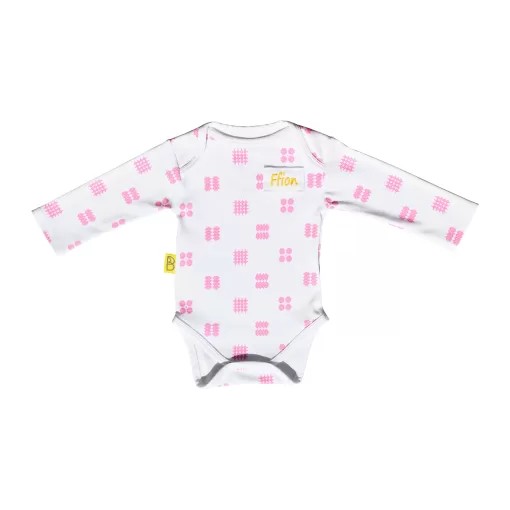 White organic cotton baby long sleeved bodysuit with pink tapestry design with two fasteners at bottom can be personalised