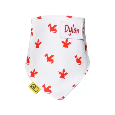 Handmade white organic cotton baby bib with a red dragon print, they are one size and have two fastenings to adjust fit