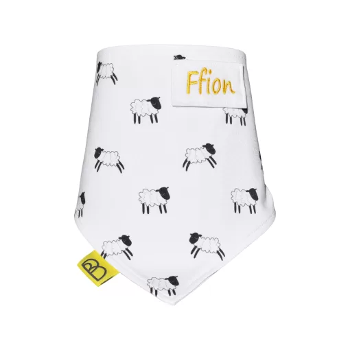 Handmade white organic cotton baby bib with black and white sheep design, one size and have two fastenings to adjust fit