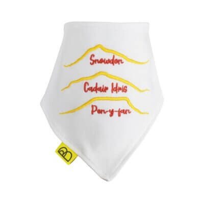 Handmade white Welsh organic cotton baby bib embroidered with words of the Welsh three peaks in yellow and red