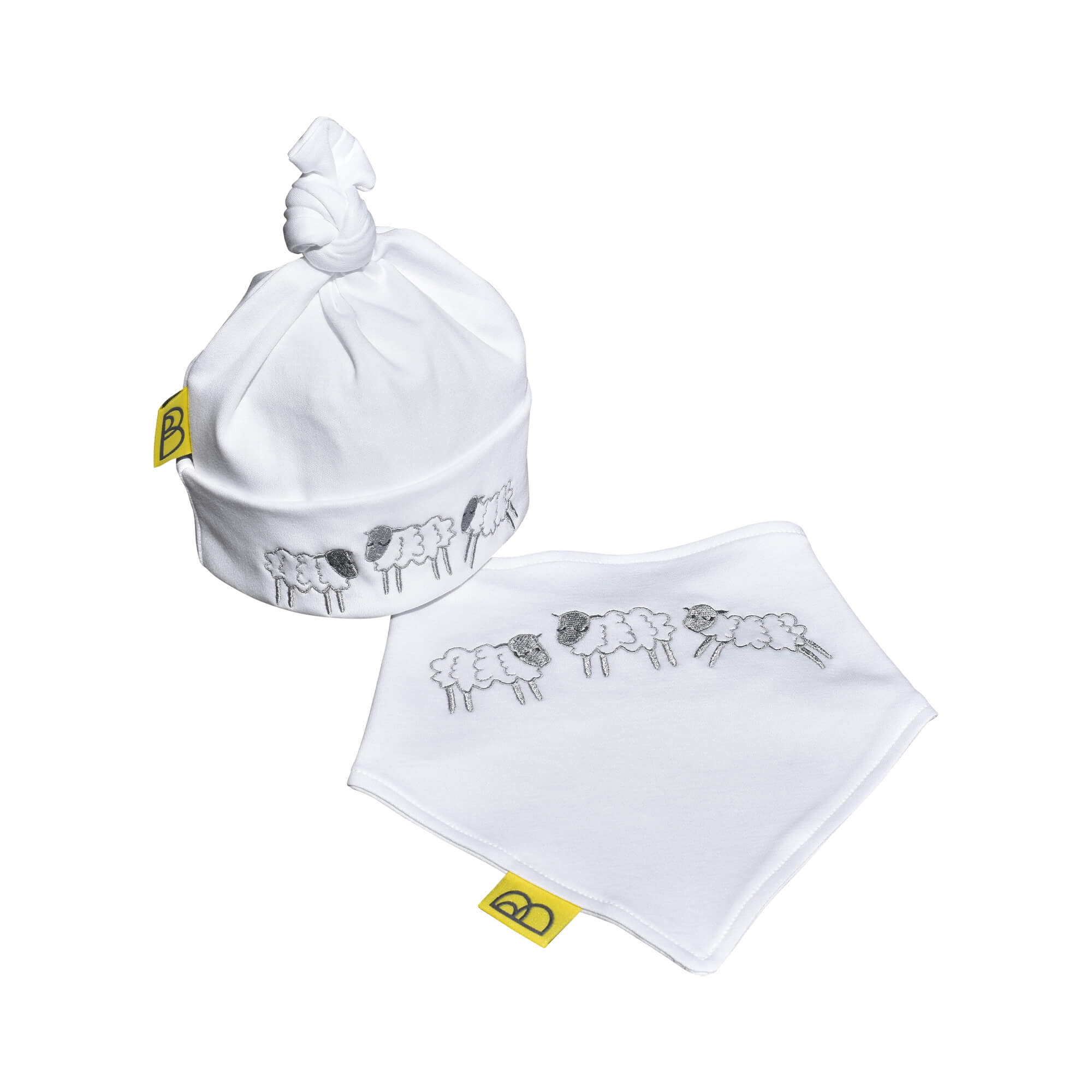 Handmade white organic cotton baby hat & bib with three embroidered grey sheep and the bib has two fastenings to adjust