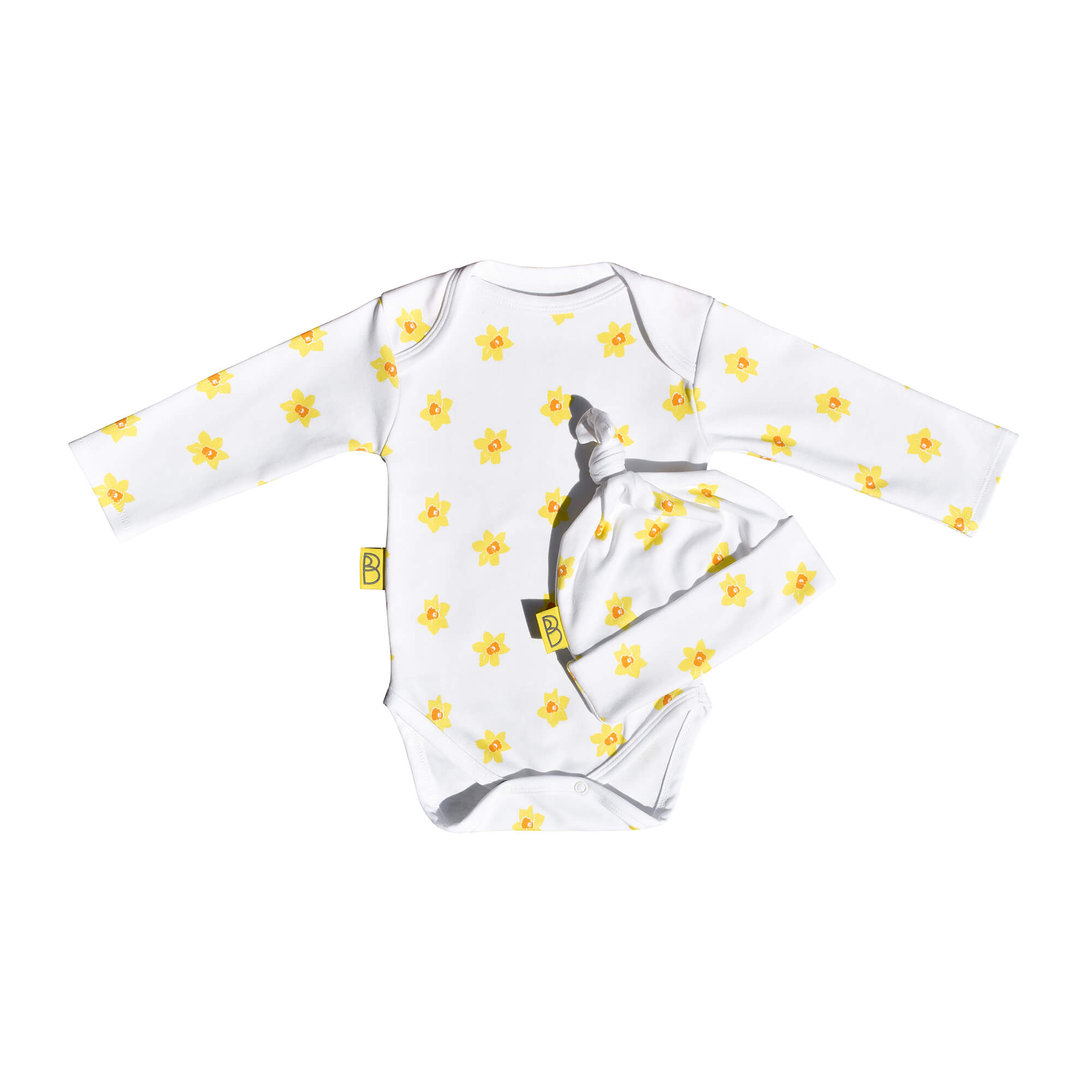 White organic cotton baby long sleeved bodysuit and hat gift set in our vibrant Welsh daffodil design and can be personalised